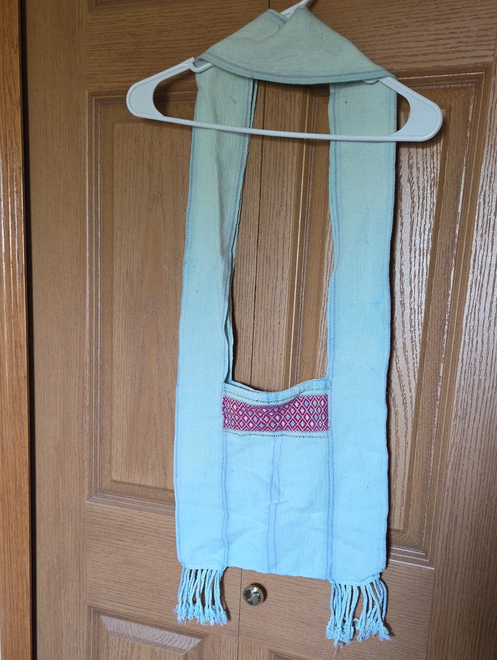 Light Blue Woven Crossbody Bag with Red Accent